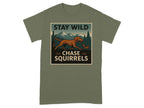 Dog chasing squirrel with text "STAY WILD CHASE SQUIRRELS" on t-shirt.