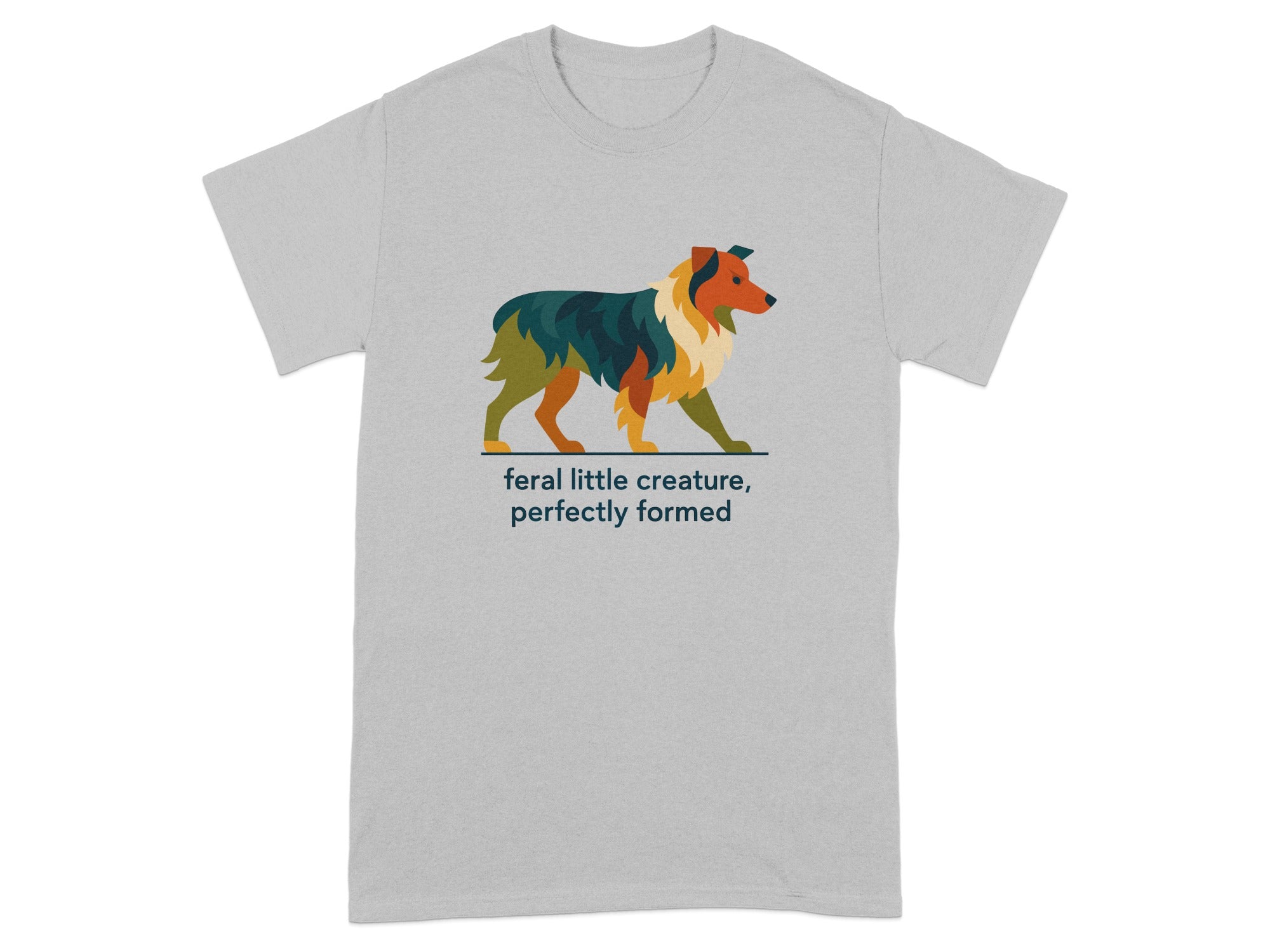 Grey t-shirt with a colorful dog illustration and text "feral little creature, perfectly formed".
