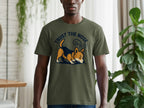 Green t-shirt with a cartoon corgi and the text "TRUST THE NOSE".