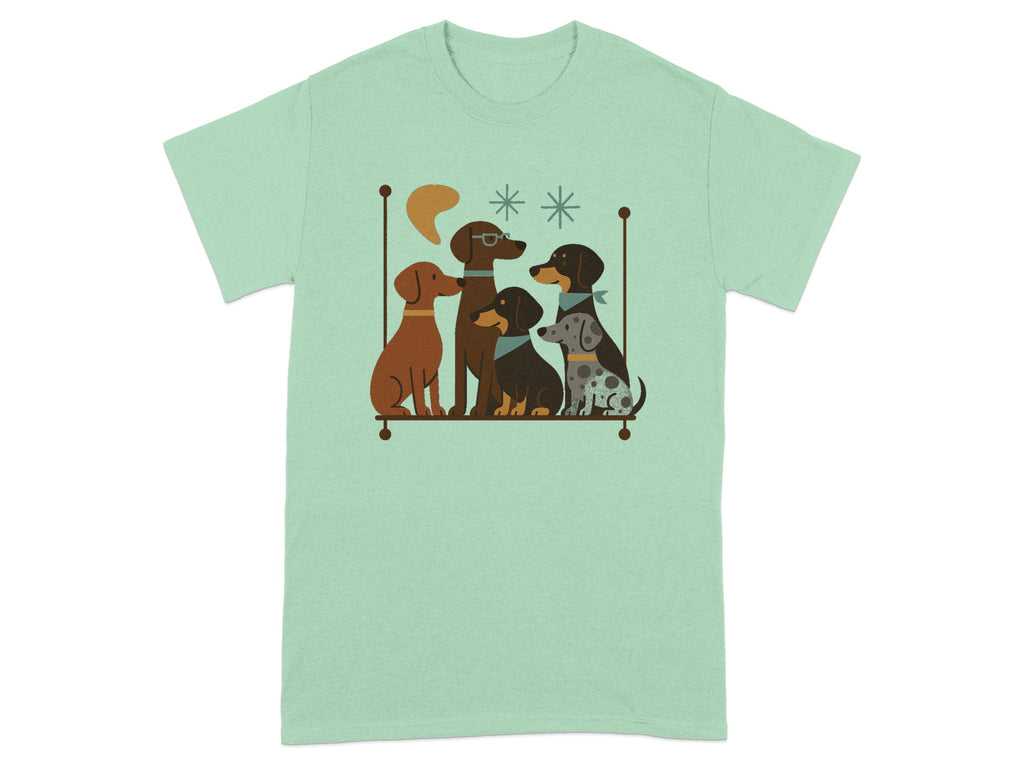 Five dogs of various breeds and colors sit together in a framed illustration on a mint green t-shirt.