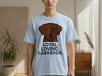 Light blue t-shirt with a brown Labrador face and text "LOYAL. LOVING. LABRADOR."