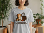 Gray t-shirt with graphic of beagle, coffee mug, and text "POWERED BY BEAGLE & COFFEE".