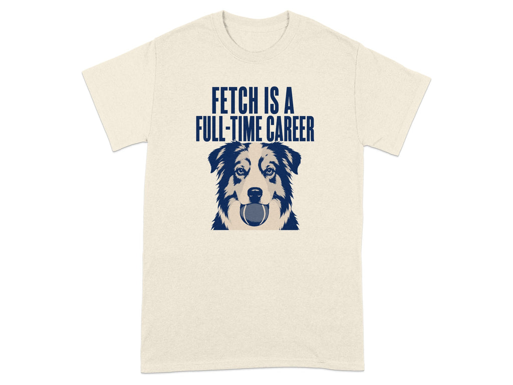 Cream t-shirt with a dog holding a ball and text "FETCH IS A FULL-TIME CAREER".