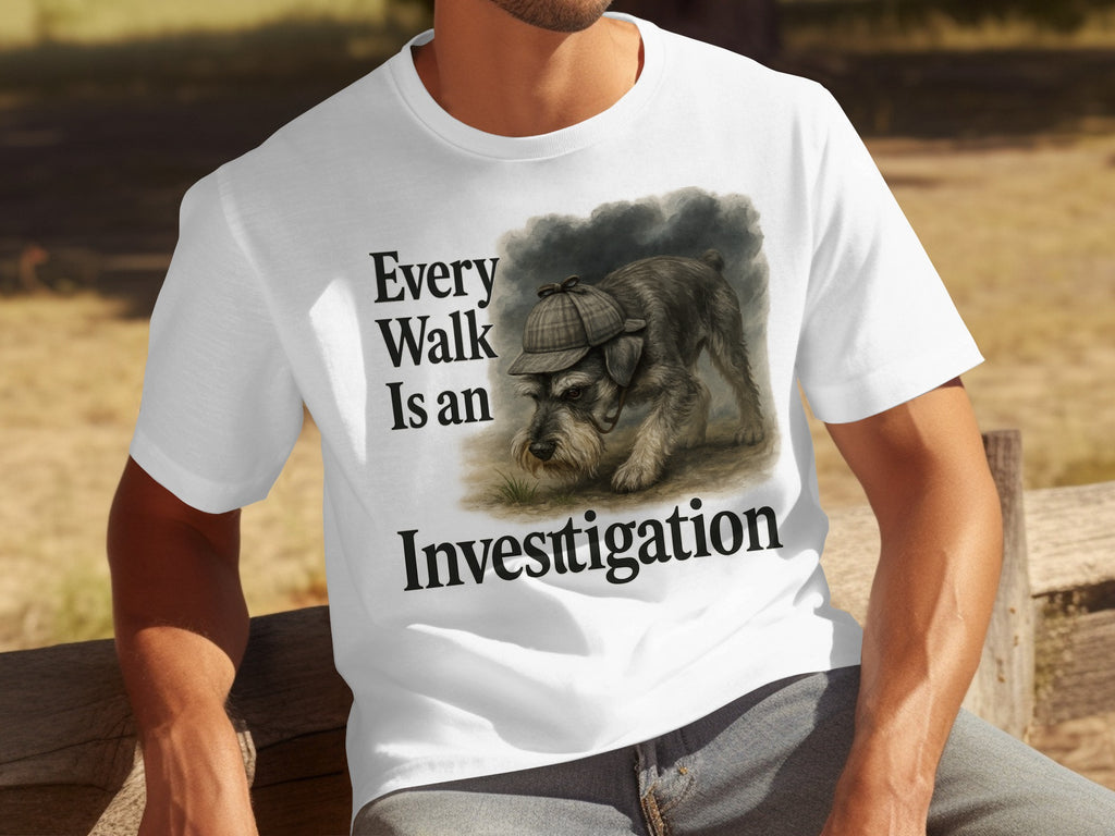 A schnauzer wearing a detective hat on a white t-shirt with "Every Walk Is an Investigation"