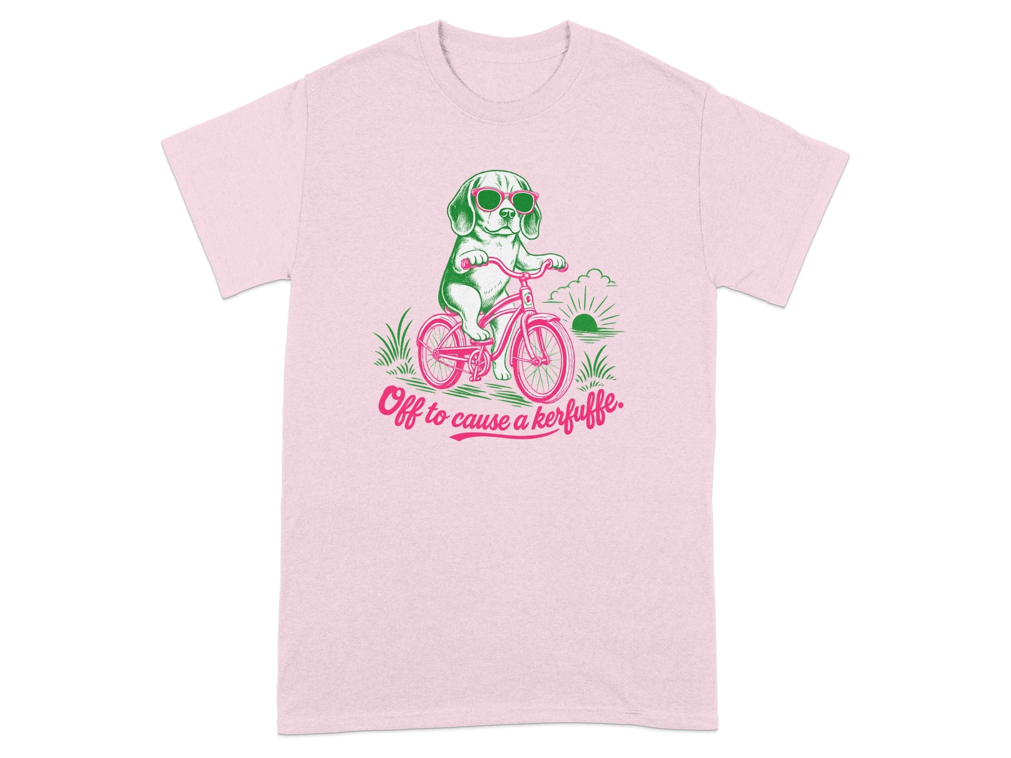 Pink t-shirt graphic of dog on bicycle wearing sunglasses, "Off to cause a kerfuffle."