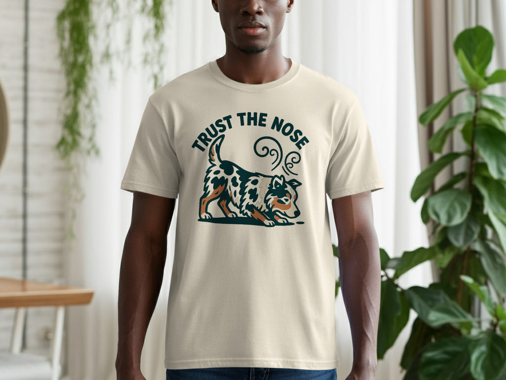 Cream t-shirt with graphic of a dog and text "TRUST THE NOSE"