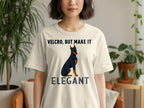 Cream t-shirt with a Doberman and text "VELCRO, BUT MAKE IT ELEGANT".