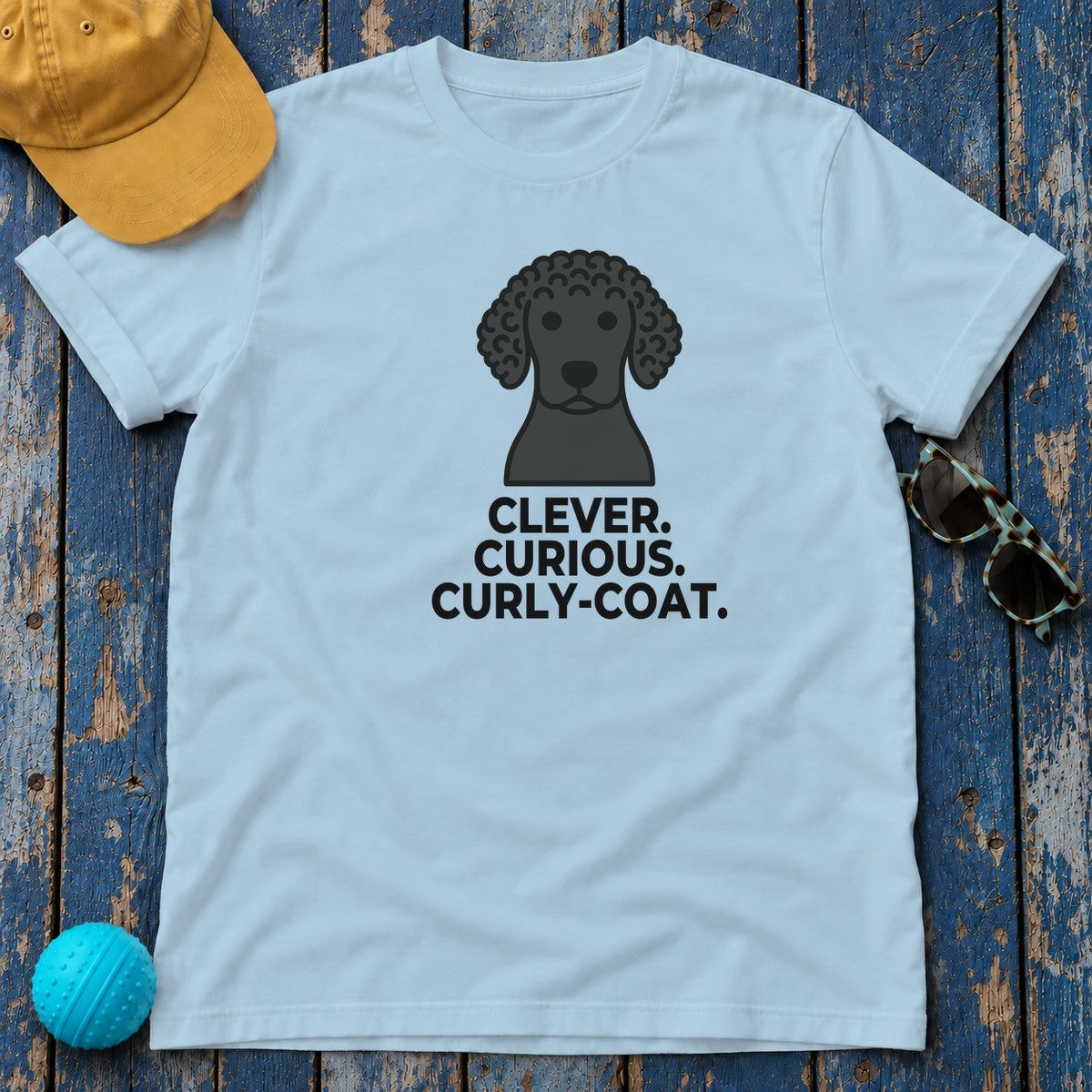 Clever. Curious. Curly-Coat. Curly-Coated Retriever T-Shirt in Light Blue