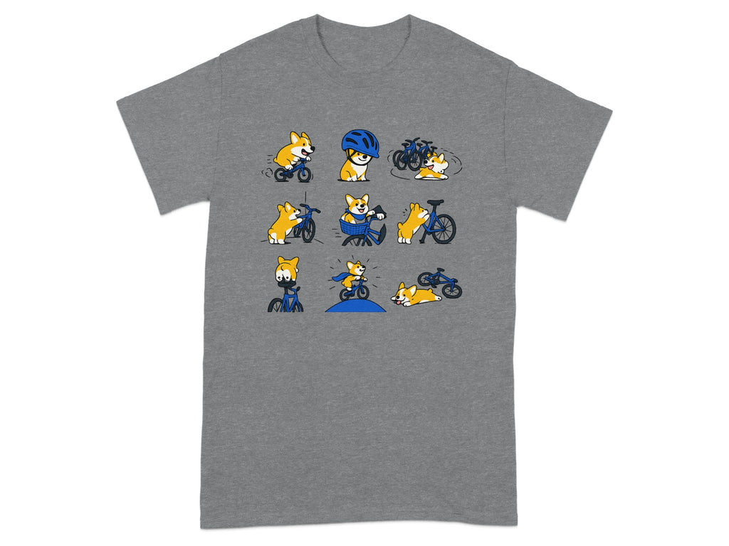 Nine cartoon corgis riding bicycles in various poses, on a grey t-shirt.