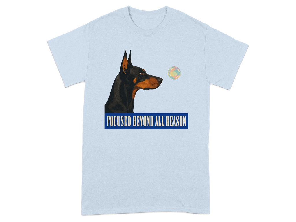 Light blue t-shirt with a Doberman's head and "FOCUSED BEYOND ALL REASON" text.