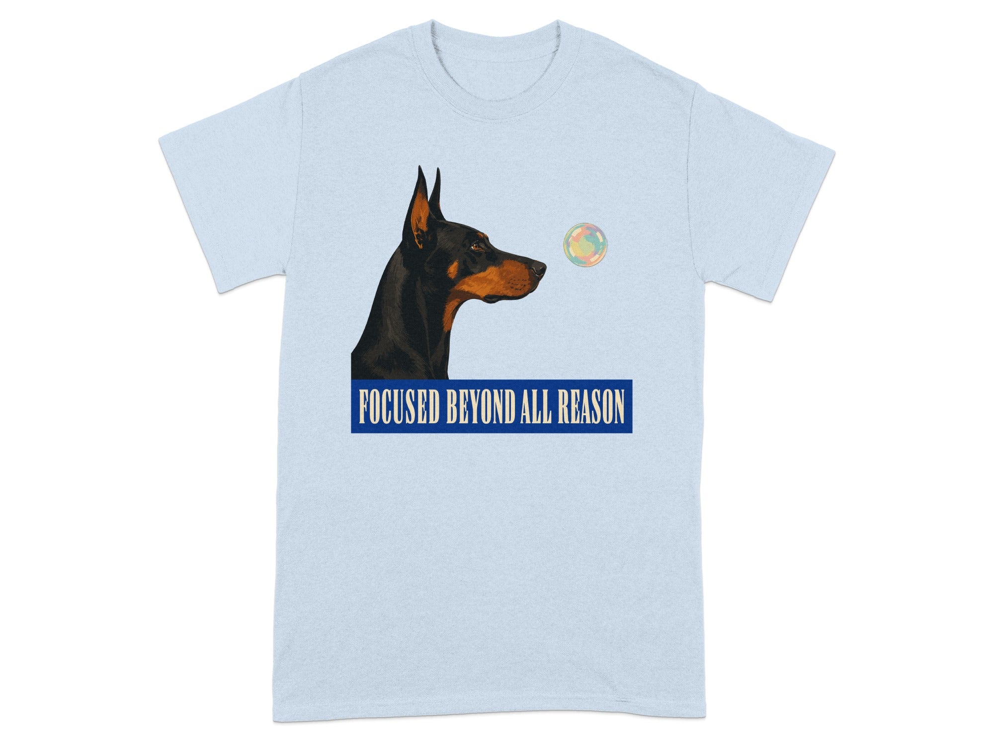 Light blue t-shirt with a Doberman's head and "FOCUSED BEYOND ALL REASON" text.