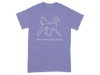 Purple t-shirt with a line drawing of a poodle and the text "Slow down, enjoy walks".