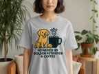 Grey t-shirt with cartoon golden retriever, coffee mug, and text "POWERED BY GOLDEN RETRIEVER & COFFEE".