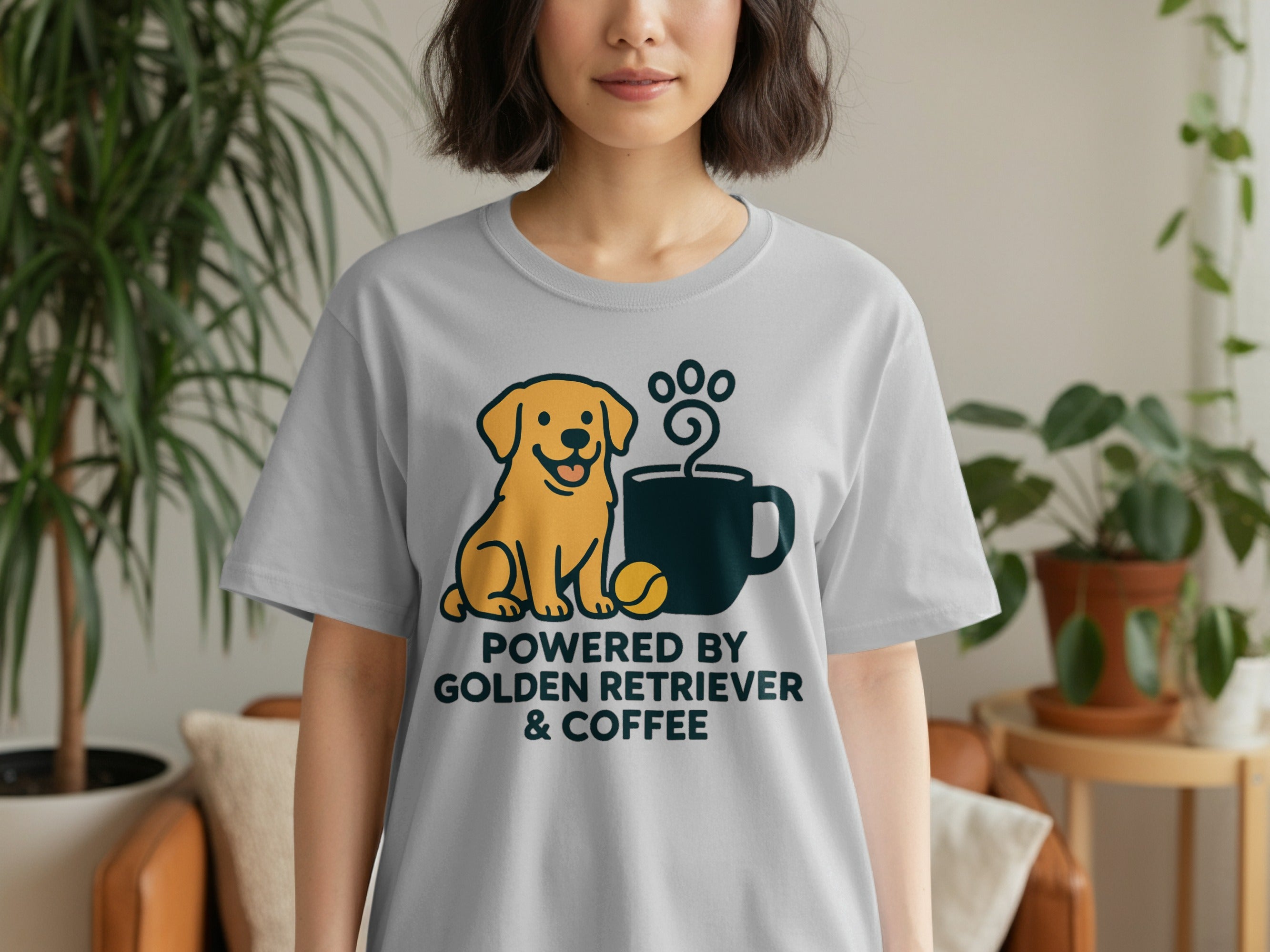 Grey t-shirt with cartoon golden retriever, coffee mug, and text "POWERED BY GOLDEN RETRIEVER & COFFEE".