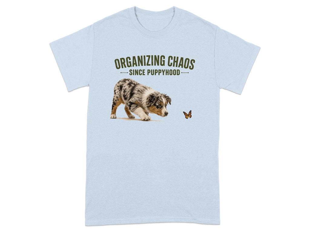 Light blue t-shirt with a dog and butterfly graphic, "ORGANIZING CHAOS" text.
