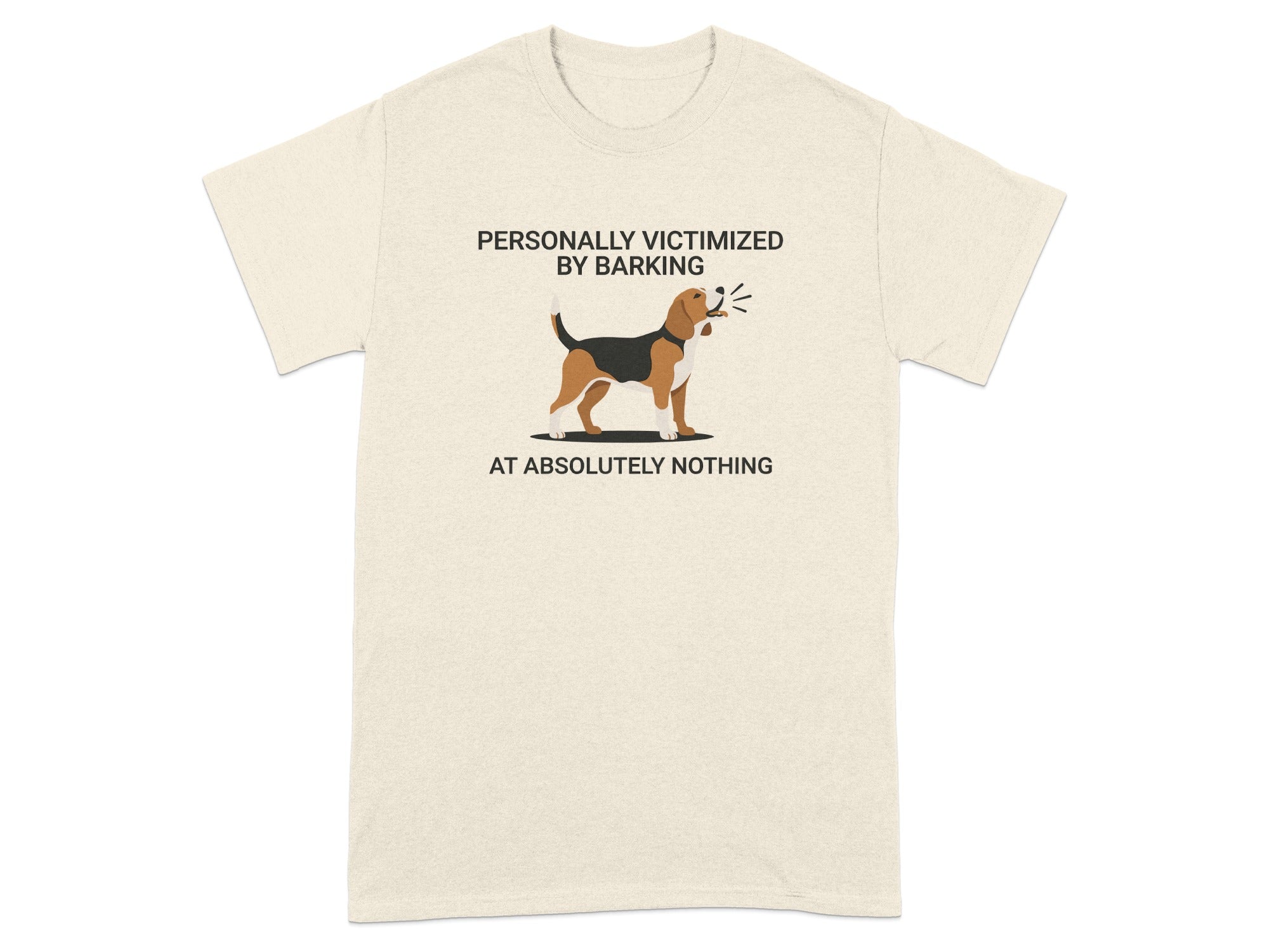 Beagle on a cream t-shirt with text "Personally victimized by barking at absolutely nothing."