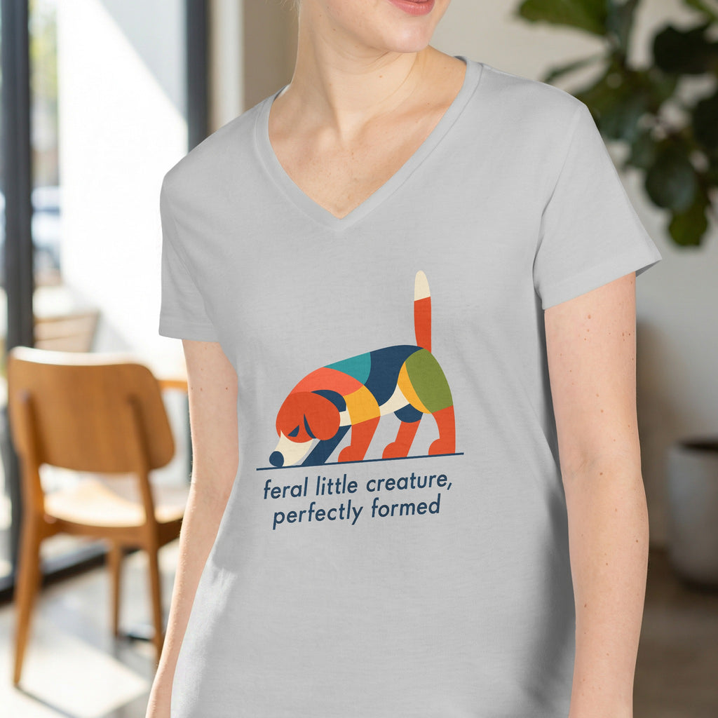 Light grey v-neck shirt with a colorful geometric dog graphic and text.