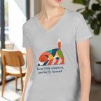 Light grey v-neck shirt with a colorful geometric dog graphic and text.