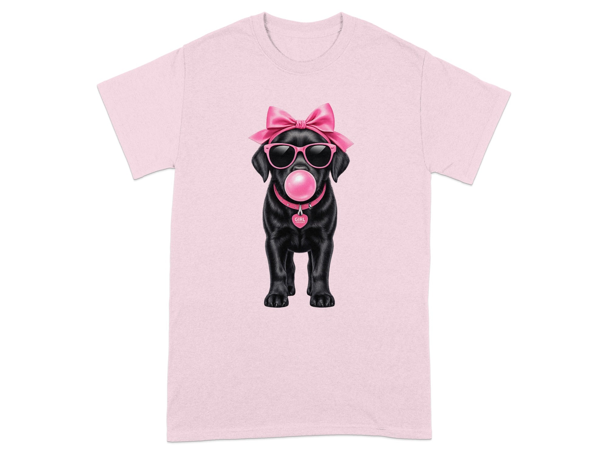 Black dog wearing sunglasses, pink bow, and bubblegum on pink t-shirt.