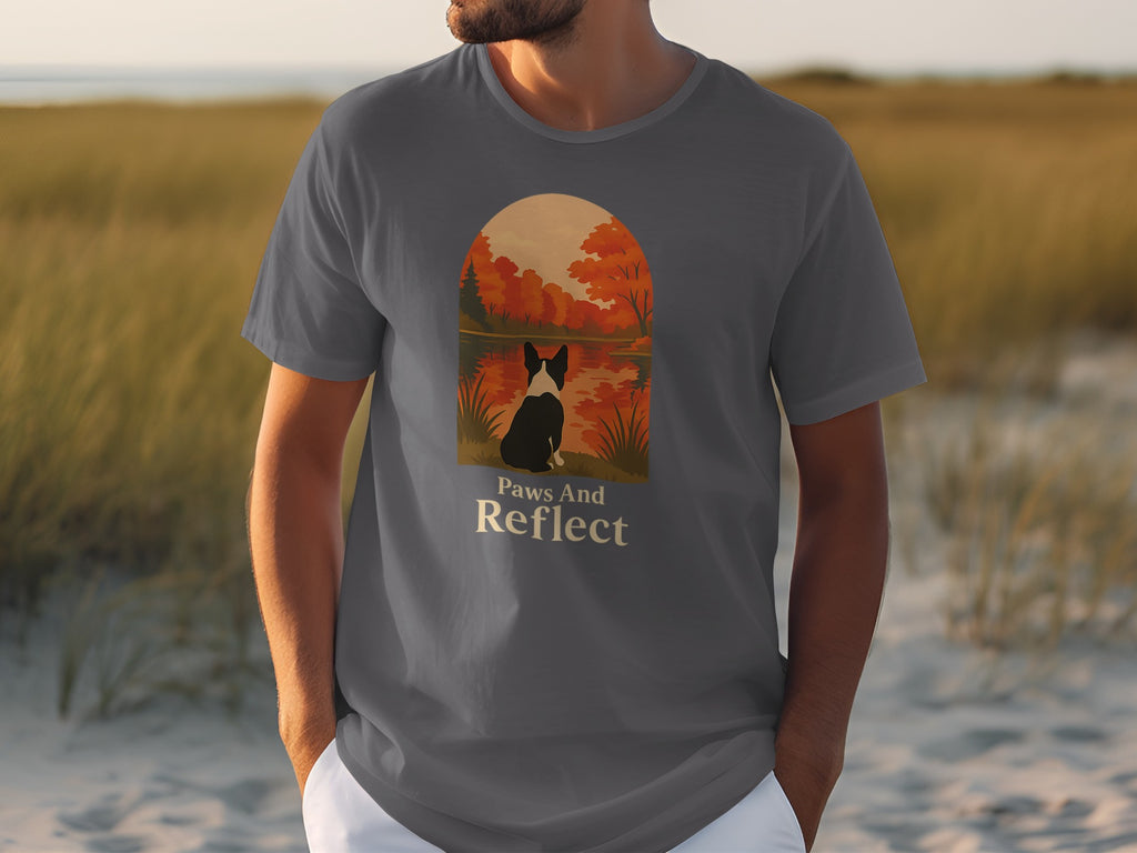T-shirt with graphic of dog and text "Paws And Reflect"