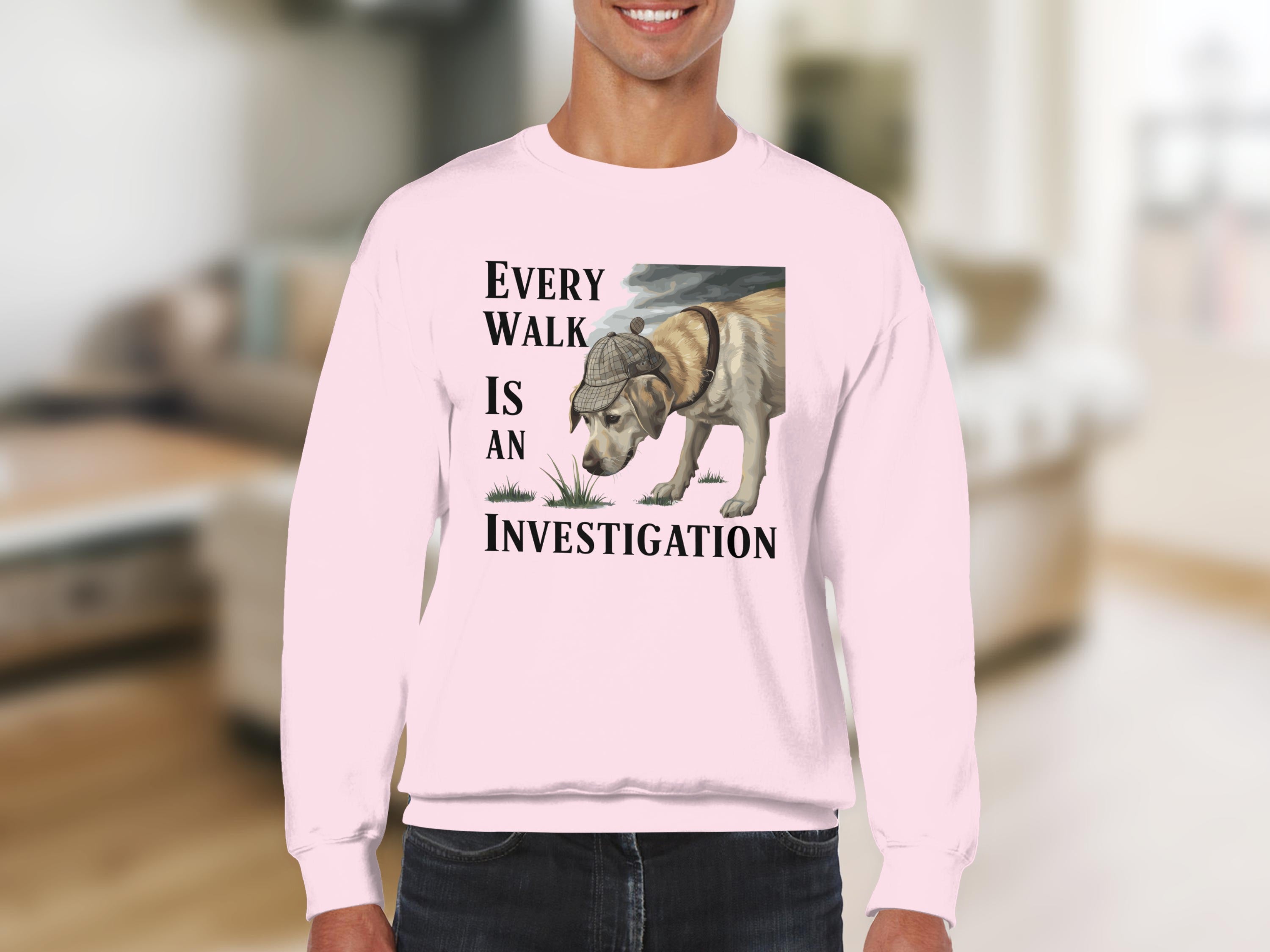 Pink sweatshirt with a dog wearing a detective hat and the text "Every walk is an investigation."