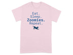 Pink t-shirt with "Eat. Sleep. Zoomies. Repeat." and a dog silhouette.