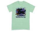 T-shirt with watercolor black dog running and text "Unleash the Joy."