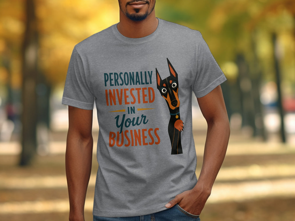 Gray t-shirt with a dog graphic and text "Personally Invested In Your Business".