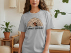Grey t-shirt with a cartoon dog peeking from under a blanket, "BLANKET GREMLIN" text.
