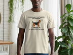 Beige t-shirt with a dog illustration and text "Personally Victimized by Barking At Absolutely Nothing".