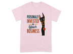 Pink t-shirt with "Personally Invested In Your Business" and dog graphic.