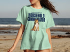 Light blue t-shirt with "PROFESSIONAL HOUSEHOLD COMMENTATOR" and a dog graphic.