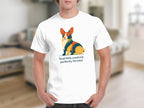 White t-shirt with stylized geometric corgi and text "feral little creature, perfectly formed".