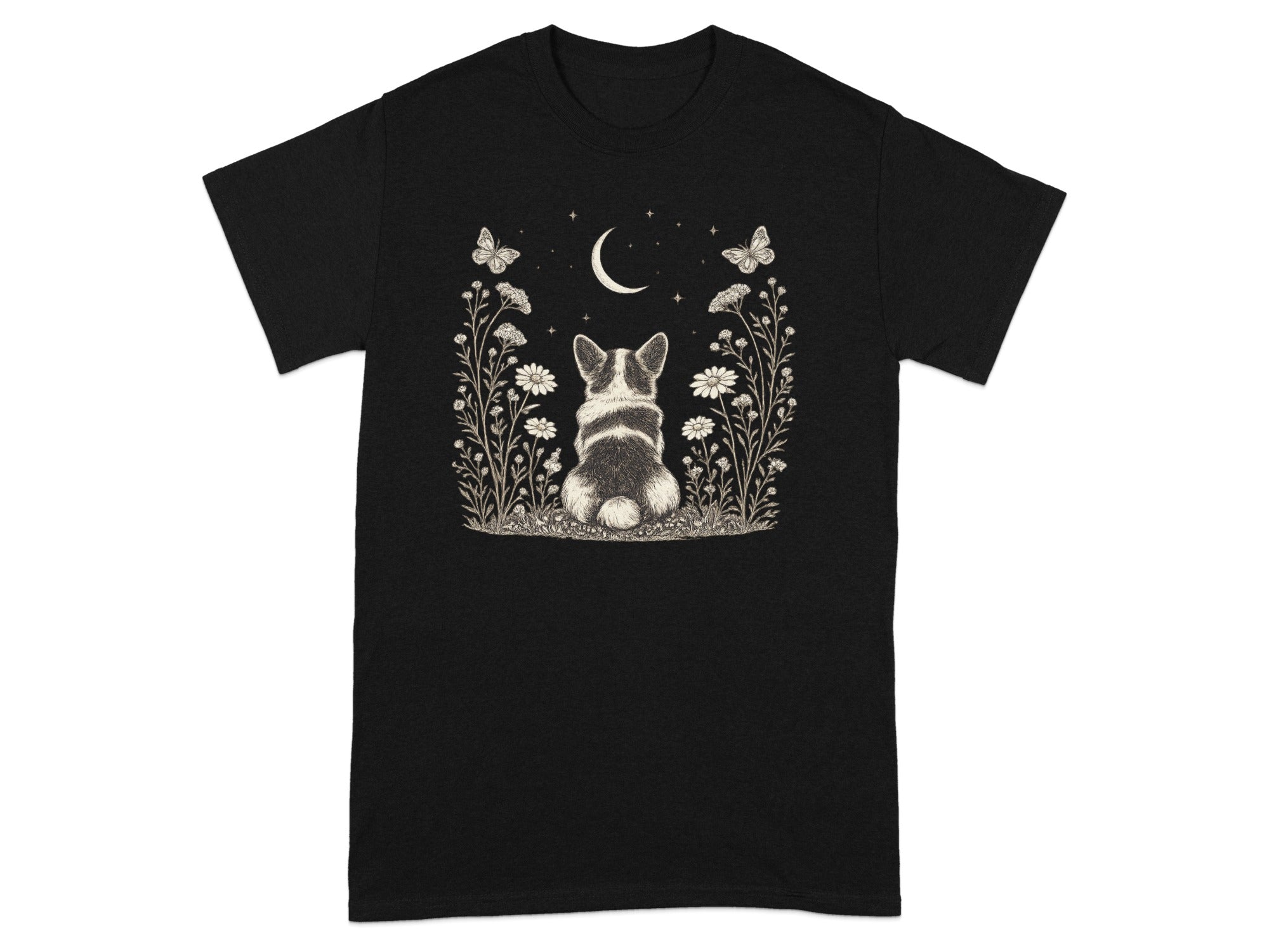 Black t-shirt with a corgi sitting in a field of flowers under a crescent moon.