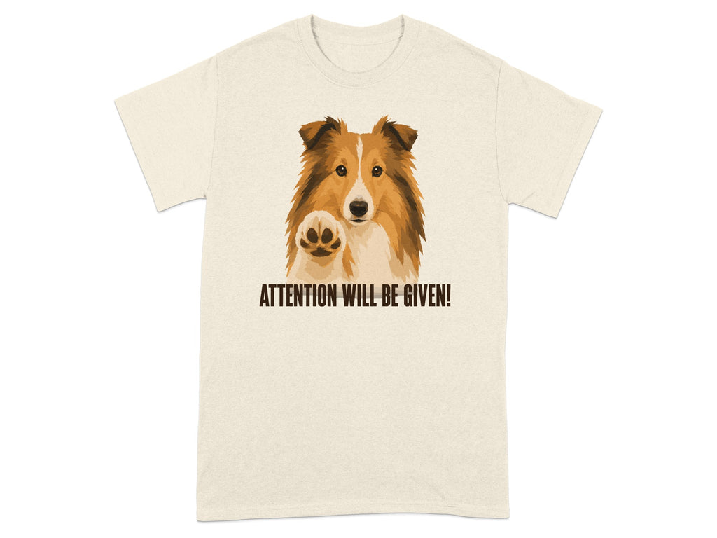 Collie dog with paw raised, saying "ATTENTION WILL BE GIVEN!".