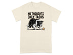 T-shirt with black and white dog and text "NO THOUGHTS ONLY TASKS".