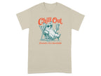 Cream t-shirt with a corgi relaxing in a chair, drinking a beverage.