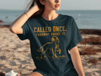 Dark blue t-shirt with dog graphic and "CALLED ONCE. THOUGHT ABOUT IT." text.