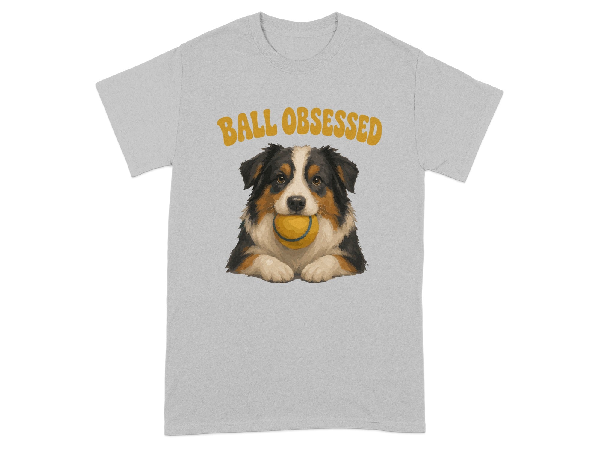 Grey t-shirt with a painted Australian Shepherd holding a yellow tennis ball in its mouth.