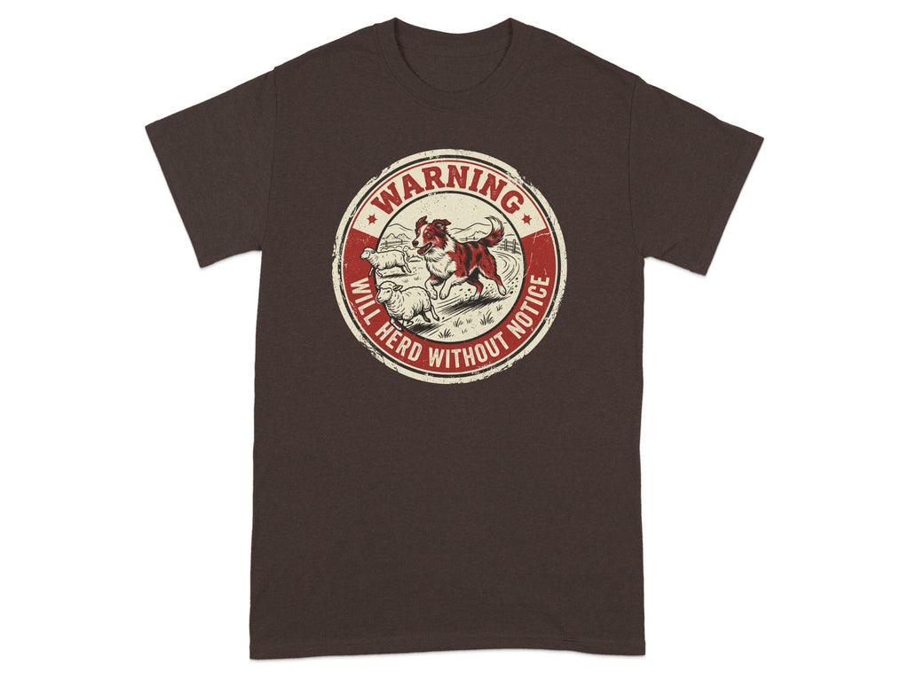 T-shirt graphic with sheepdog herding sheep, "WARNING WILL HERD WITHOUT NOTICE" text.