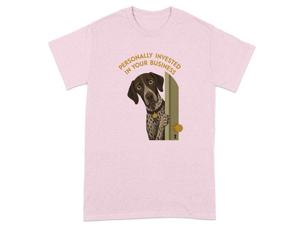 Pink t-shirt with a dog peeking through a door with text "PERSONALLY INVESTED IN YOUR BUSINESS".