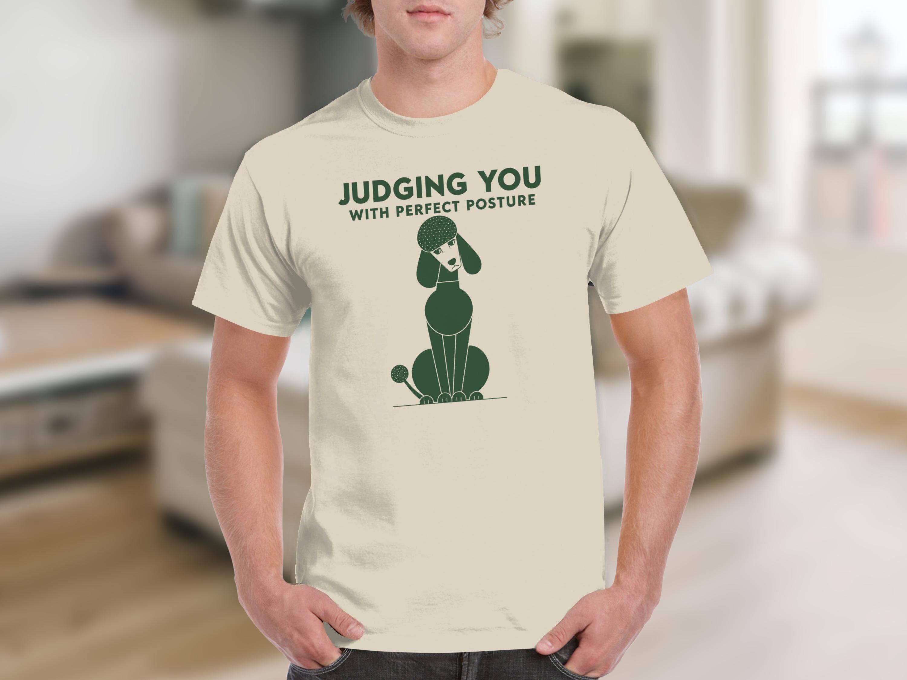 Cream t-shirt with green poodle graphic and "JUDGING YOU WITH PERFECT POSTURE" text.