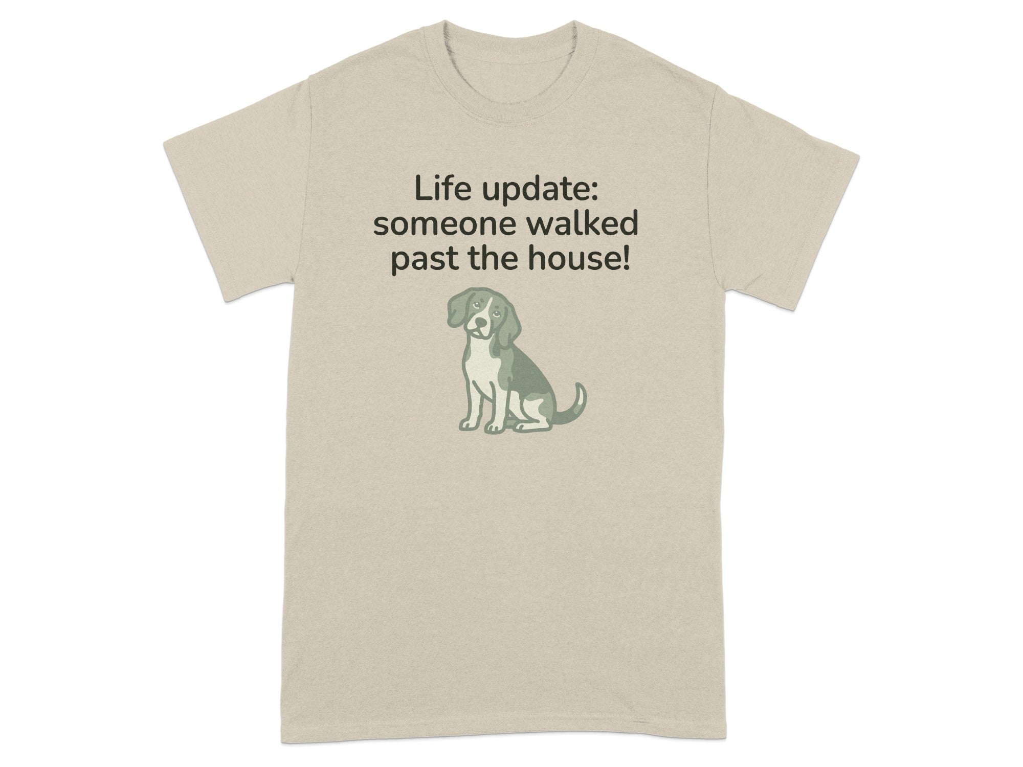 Beige t-shirt with a dog graphic and "Life update: someone walked past the house!"
