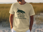 Beige t-shirt with black beagle graphic and text "Life update: My beagle smelled a thing."