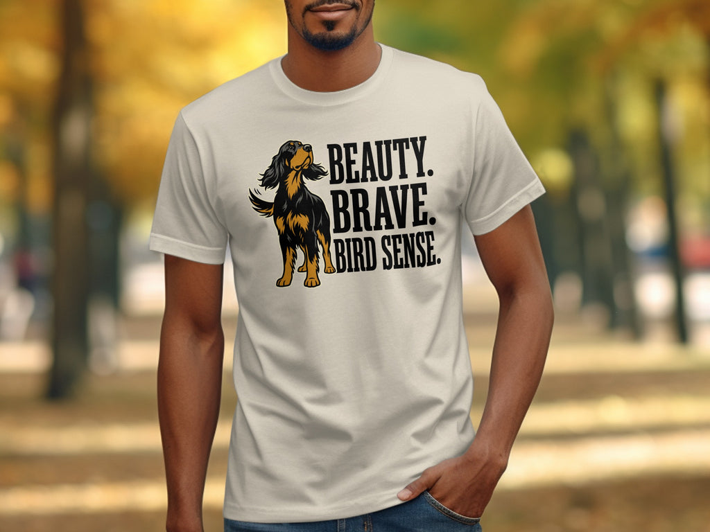 Cream t-shirt with black and tan dog and text "BEAUTY. BRAVE. BIRD. SENSE."