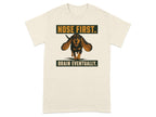 Cream t-shirt with graphic of a dachshund running with text "NOSE FIRST. BRAIN EVENTUALLY."