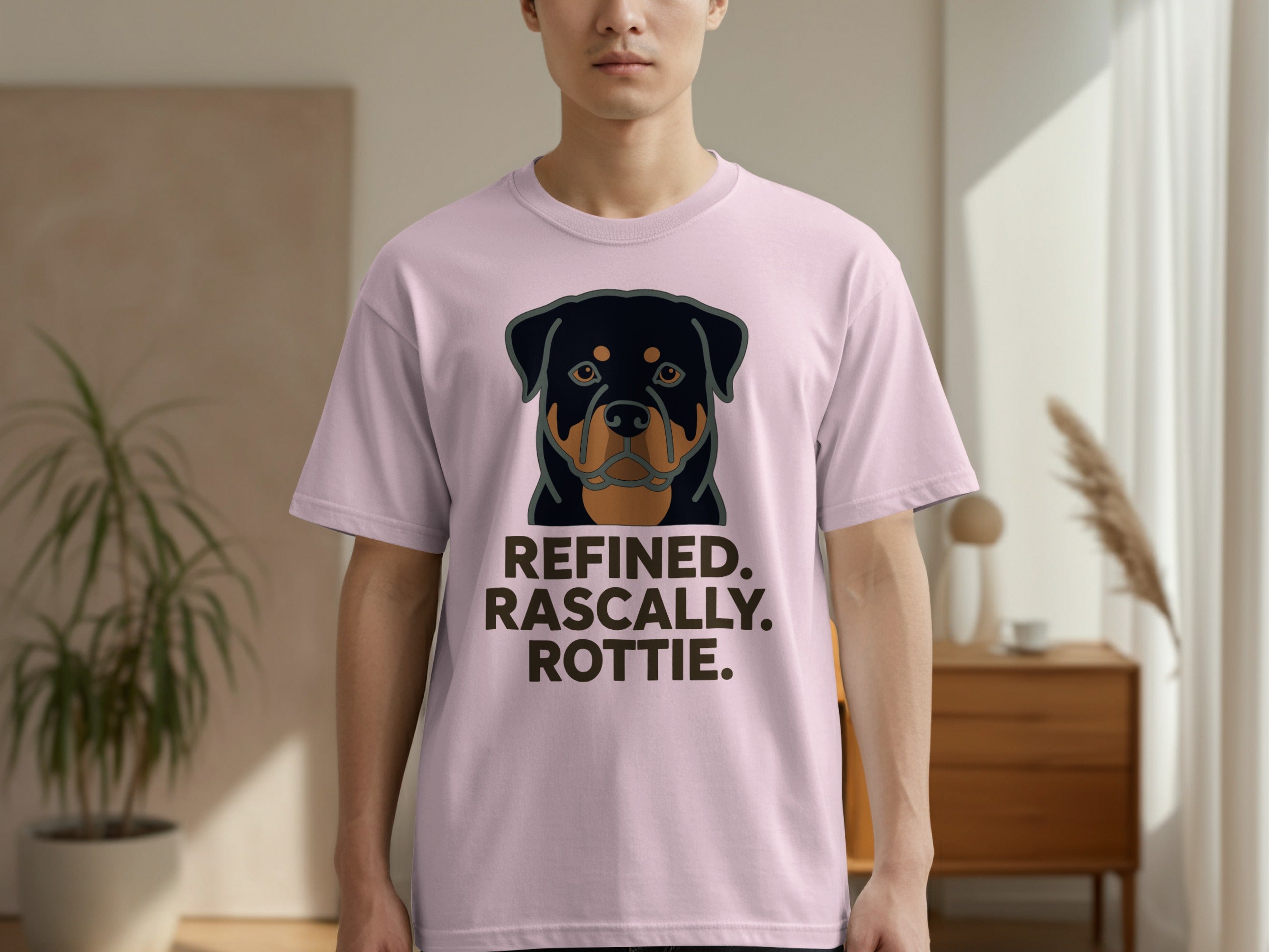 Pink t-shirt with a Rottweiler portrait and text "REFINED. ROTTIE. ROTTIE."