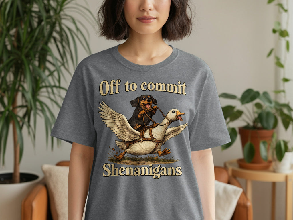Dachshund riding a goose with text "Off to commit Shenanigans".