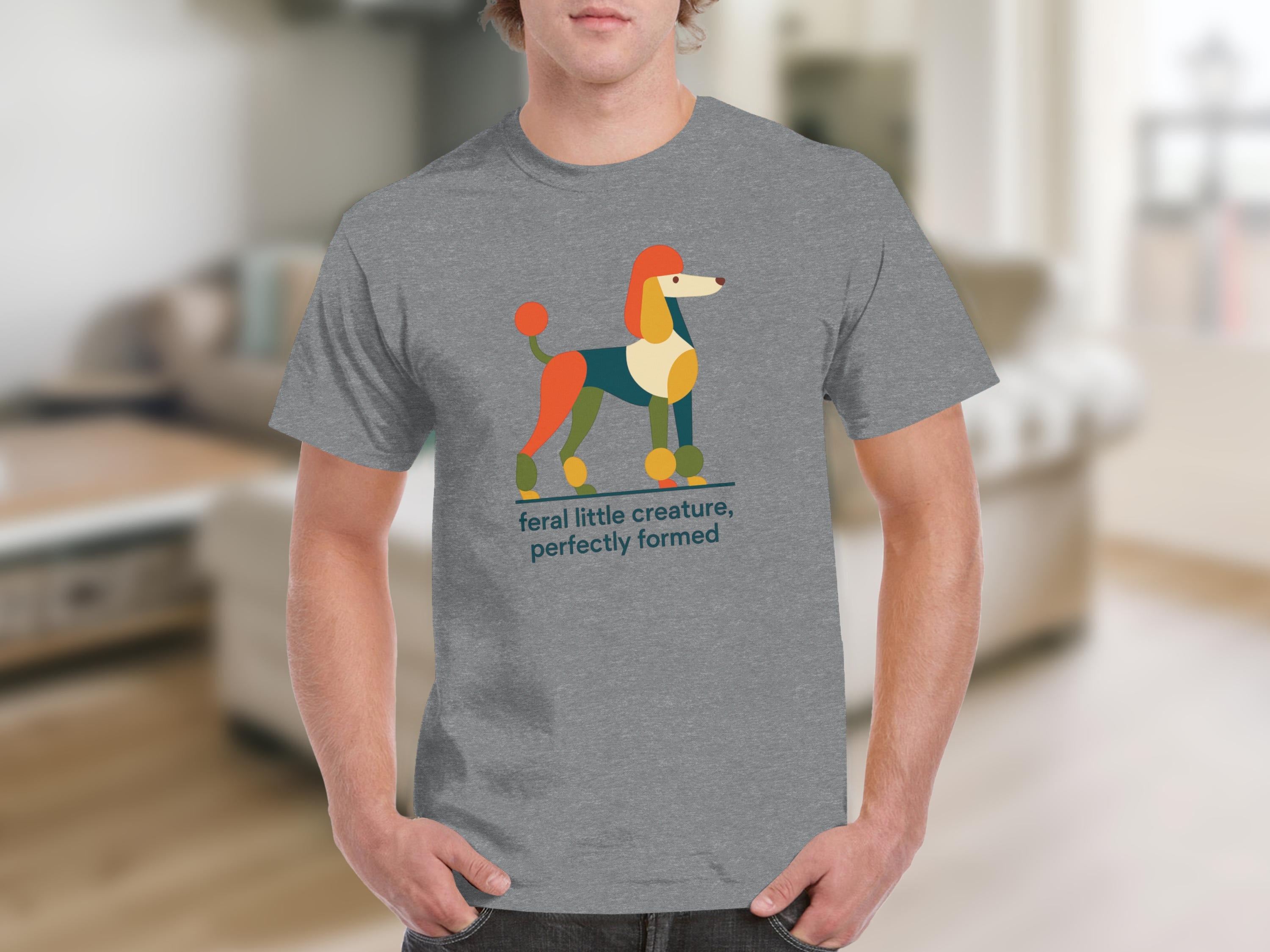 Grey t-shirt displaying a colorful, geometric poodle illustration with text.