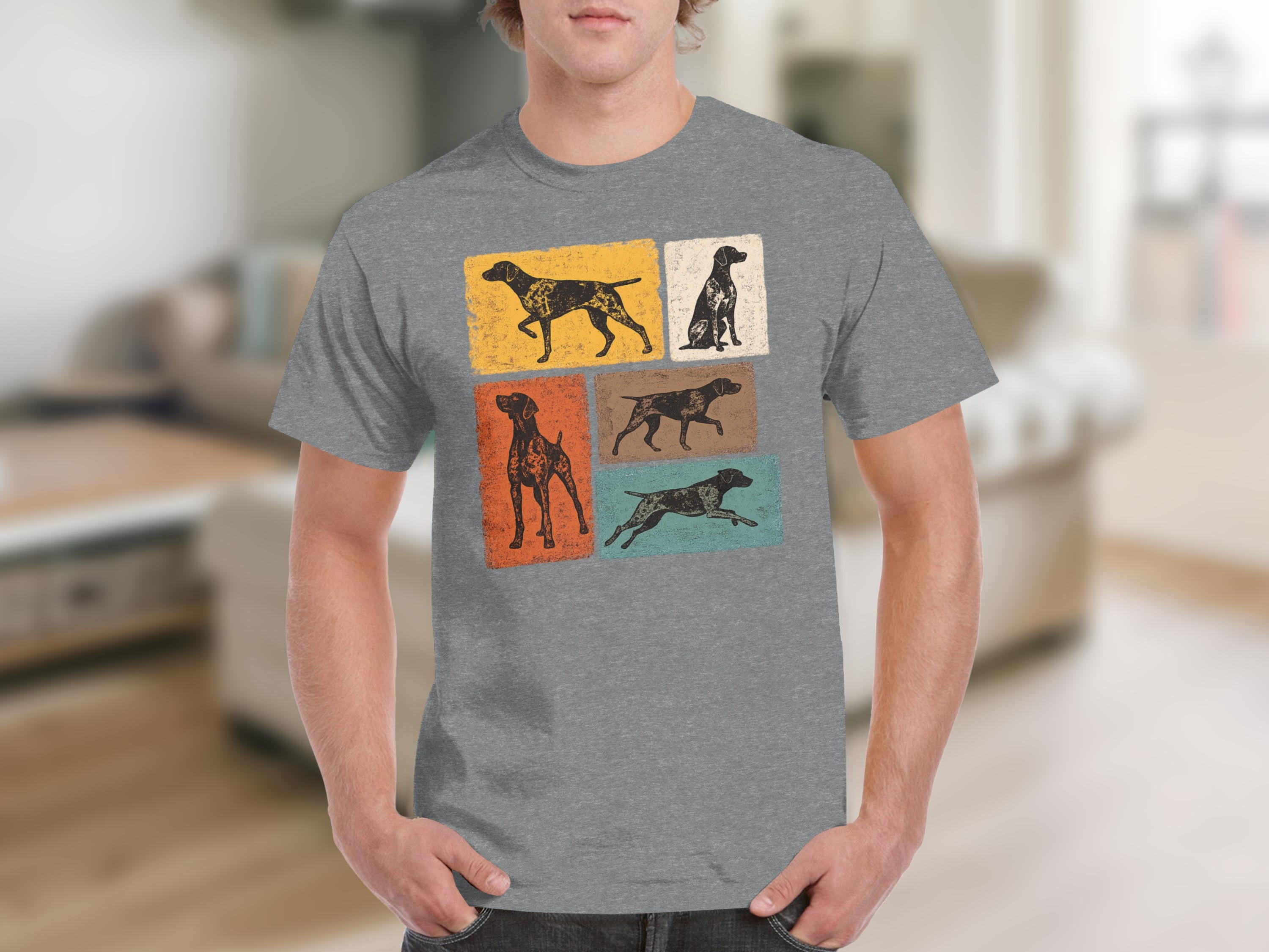 Gray t-shirt with a graphic of four German Shorthaired Pointers in different poses and colors.